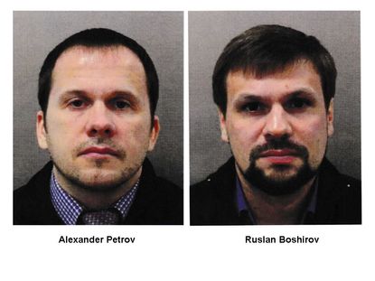 Two Russians accused of poisoning ex-spy in Britain