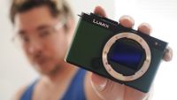 James Artaius holding a Panasonic Lumix S9, with the sensor exposed