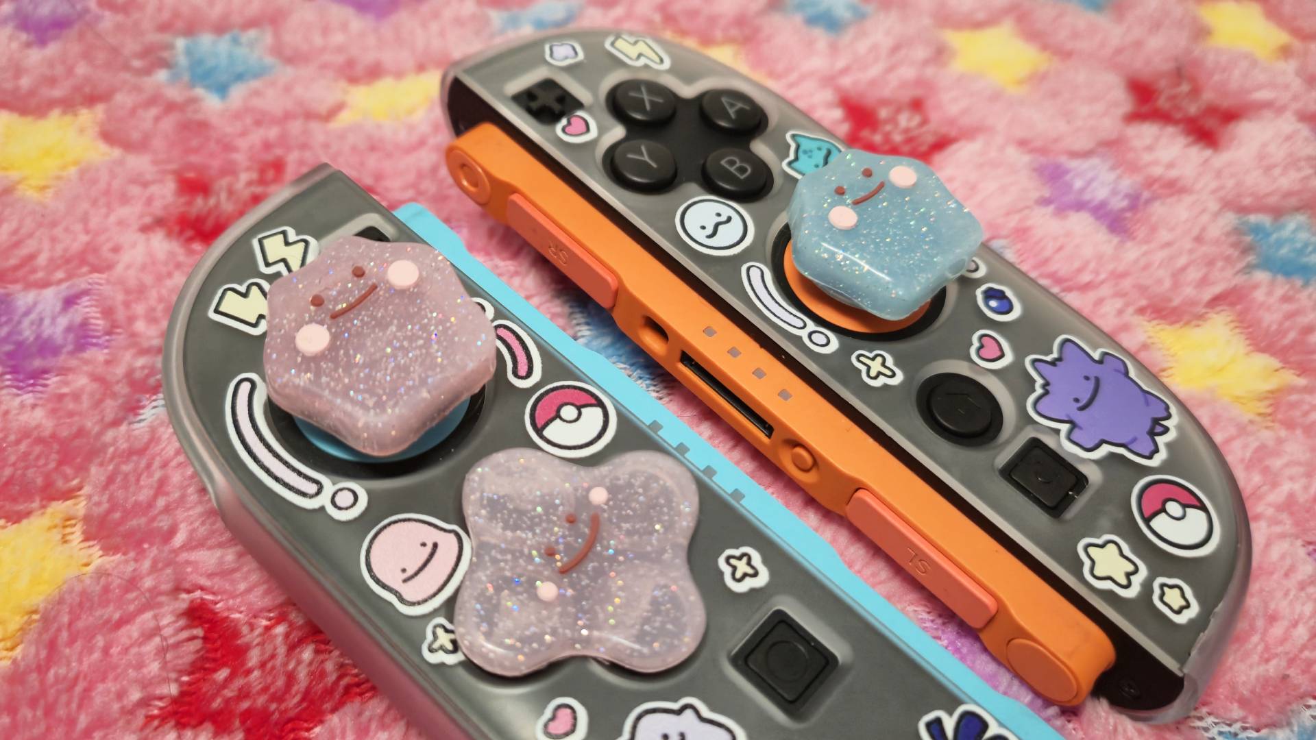 Photo of a set of Ditto thumb grips on a pair of Switch 2 Joy-Con controllers.