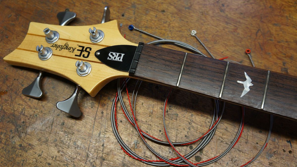 A string-less bass guitar ready for restringing