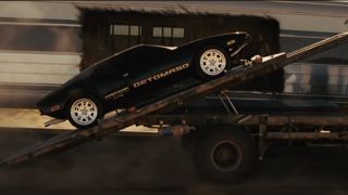 A car being stolen off the train in Fast Five