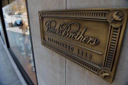 A sign on the Brooks Brothers store on Madison Avenue on the Upper East Side of Manhattan April 10, 2013 2013 in New York.