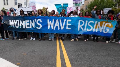 A woman marching for women's rights