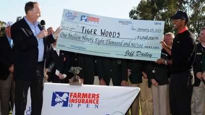 tiger woods with a cheque