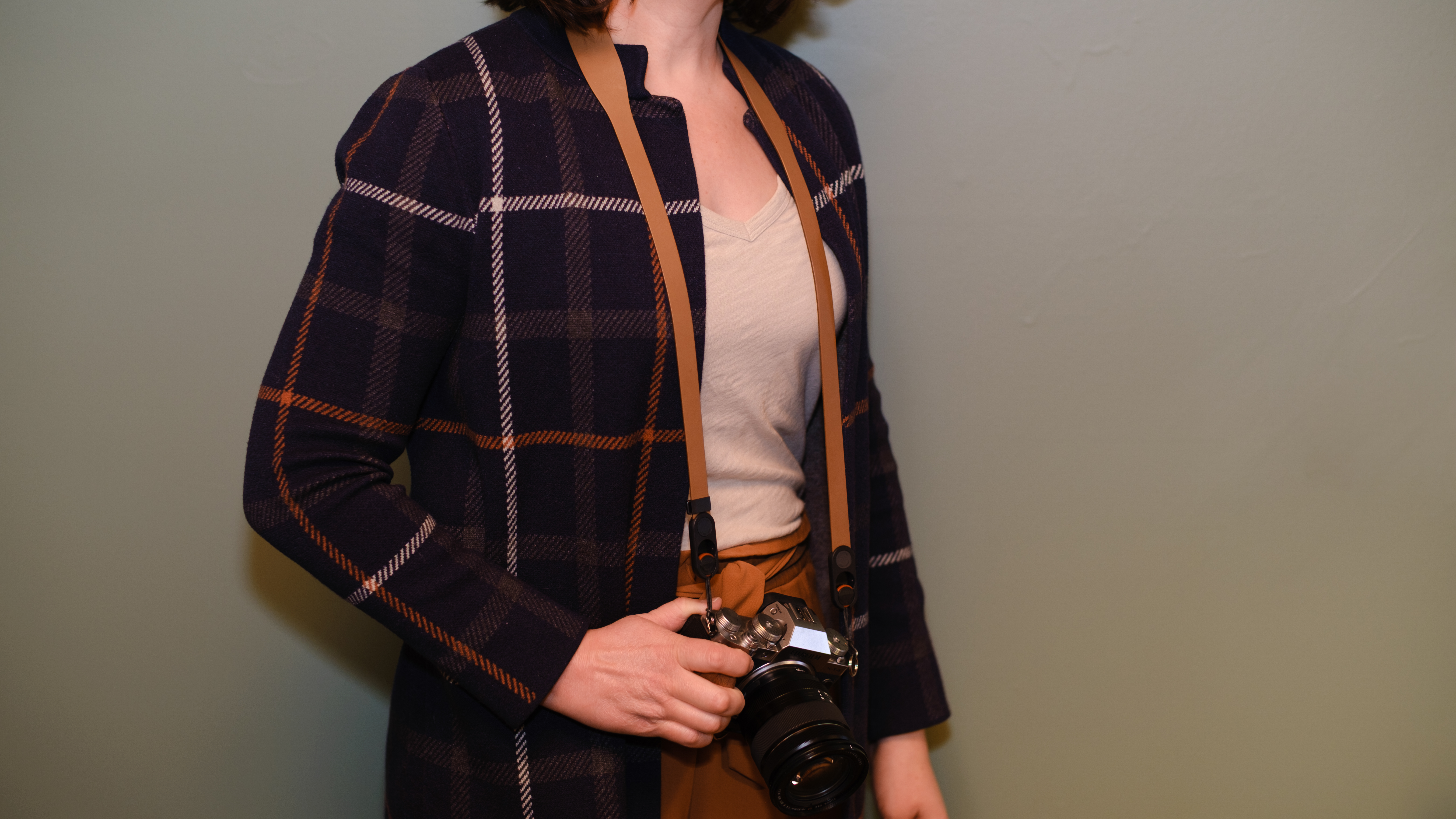 The Peak Design Form leather camera strap in the Amber color