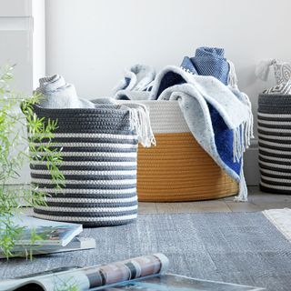 rope storage baskets in grey and white