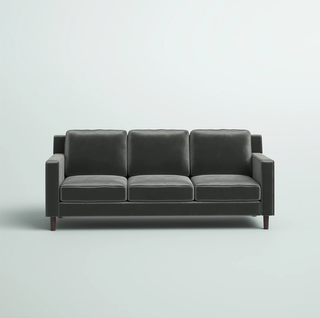 Gray velvet sofa.