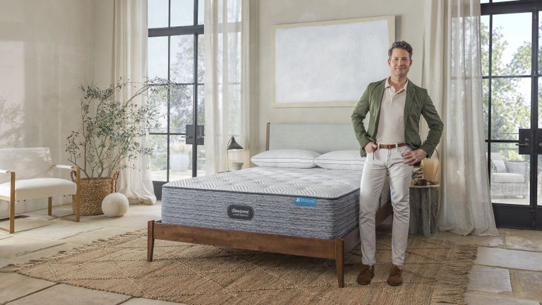 Nate Berkus with mattress and pillows from his Beautyrest collection