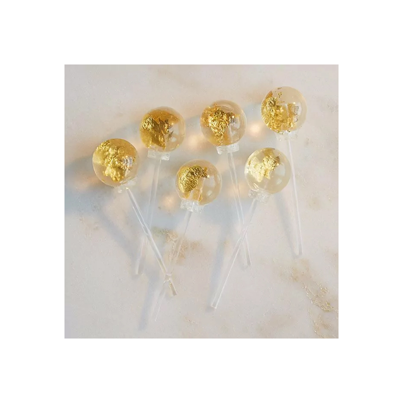 These edible gold lollipops are a 50th birthday gift idea that will appeal to her sweet tooth 