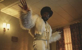 Black Mirror season 6: Paapa Essiedu in a 70's disco-style outfit