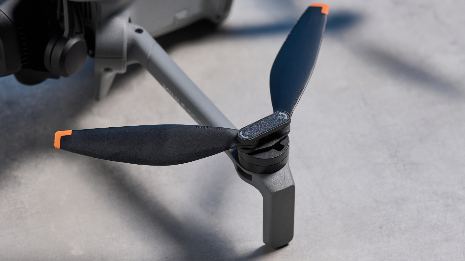 A dark grey DJI Mini 5 Pro drone
