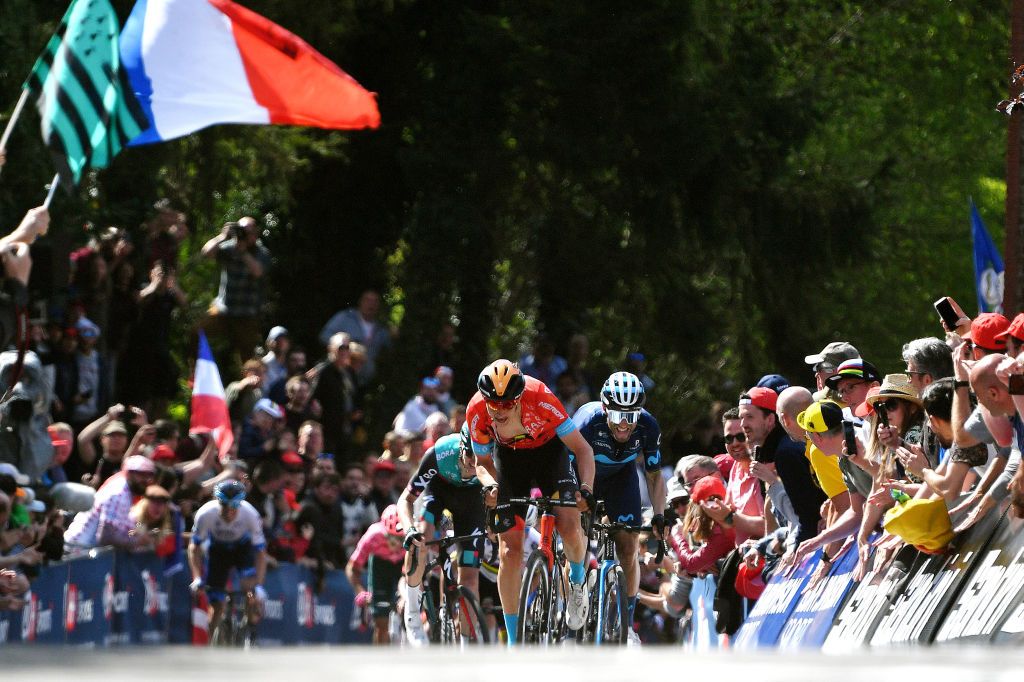 HUY BELGIUM APRIL 20 LR Dylan Teuns of Belgium and Team Bahrain Victorious and Alejandro Valverde Belmonte of Spain and Movistar Team sprint at finish line during the 86th La Flche Wallonne 2022 Mens Elite a 2011km one day race from Blegny to Mur de Huy 204m WorldTour FlecheWallonne on April 20 2022 in Huy Belgium Photo by Luc ClaessenGetty Images