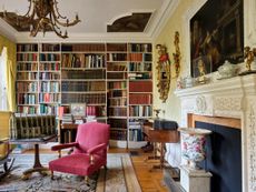 Fig 2: The study, with its painted ceiling panels and fireplace overmantel. The latter is a 1771 copy of Hogarth’s The Lady’s Last Stake. ©Paul Highnam for Country Life