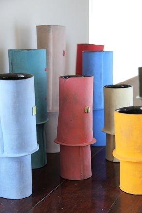 Different coloured ceramic totems