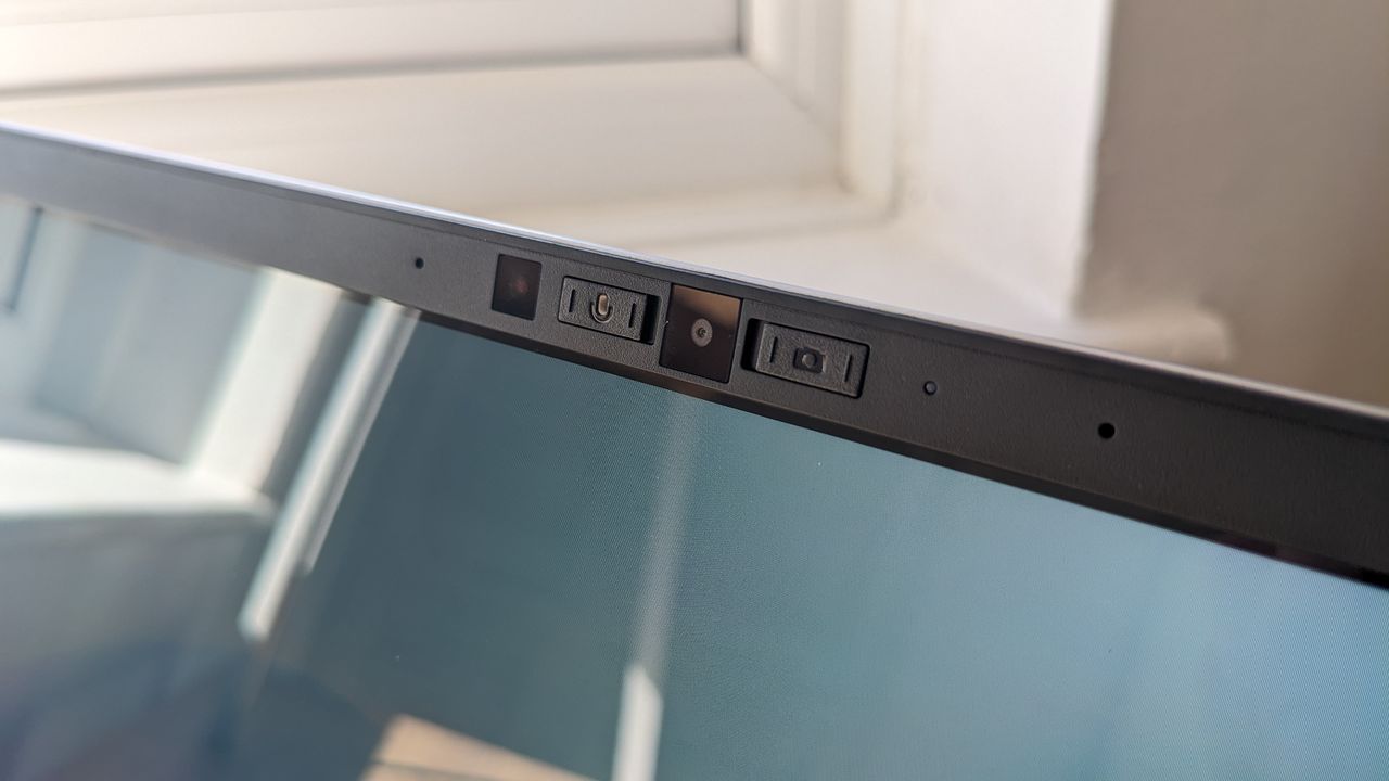 The Framework Laptop Chromebook Edition photographed on a wooden desk.