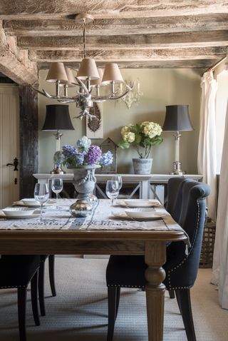 Dining area with antler chandelier