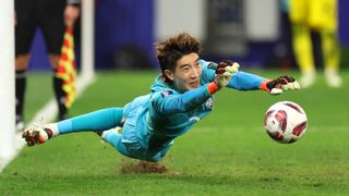 Goalkeeper Jo Hyeon-Woo of South Korea enacts a diving save ahead of the Jordan vs South Korea AFC Asian Cup 2024 clash. 