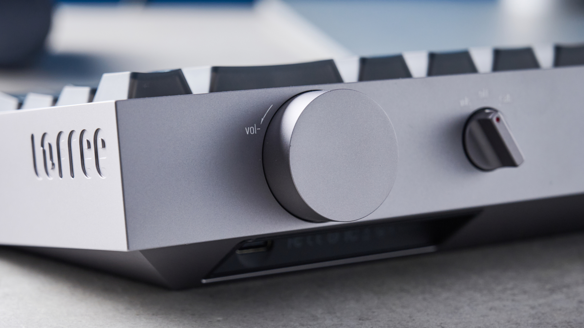 The Lofree Hyzen keyboard on a stone surface