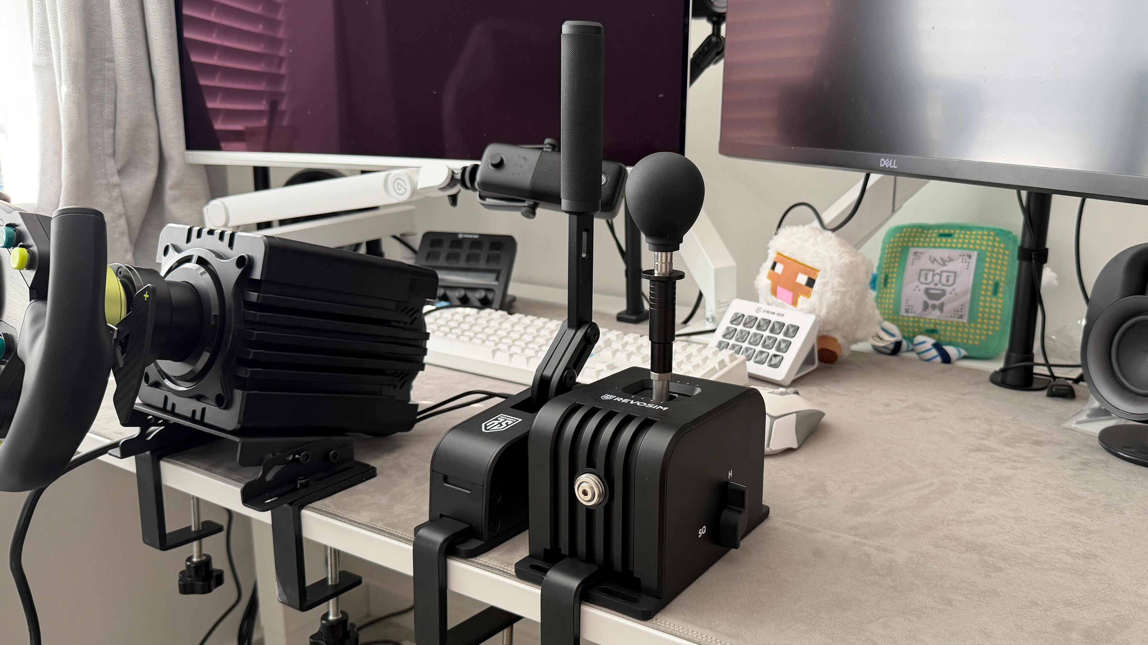 A Revosim's RS Pure bundle on a desk with the add-ons