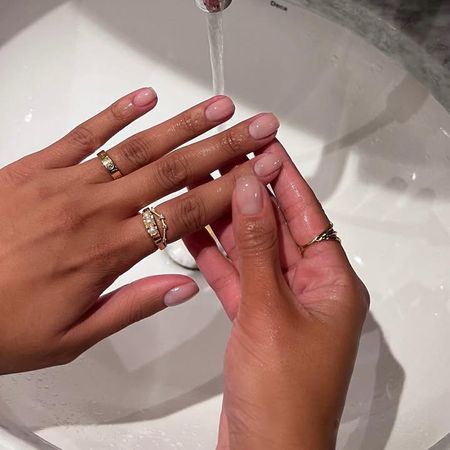 Photo of Iram Shelton wearing OPI nail polish