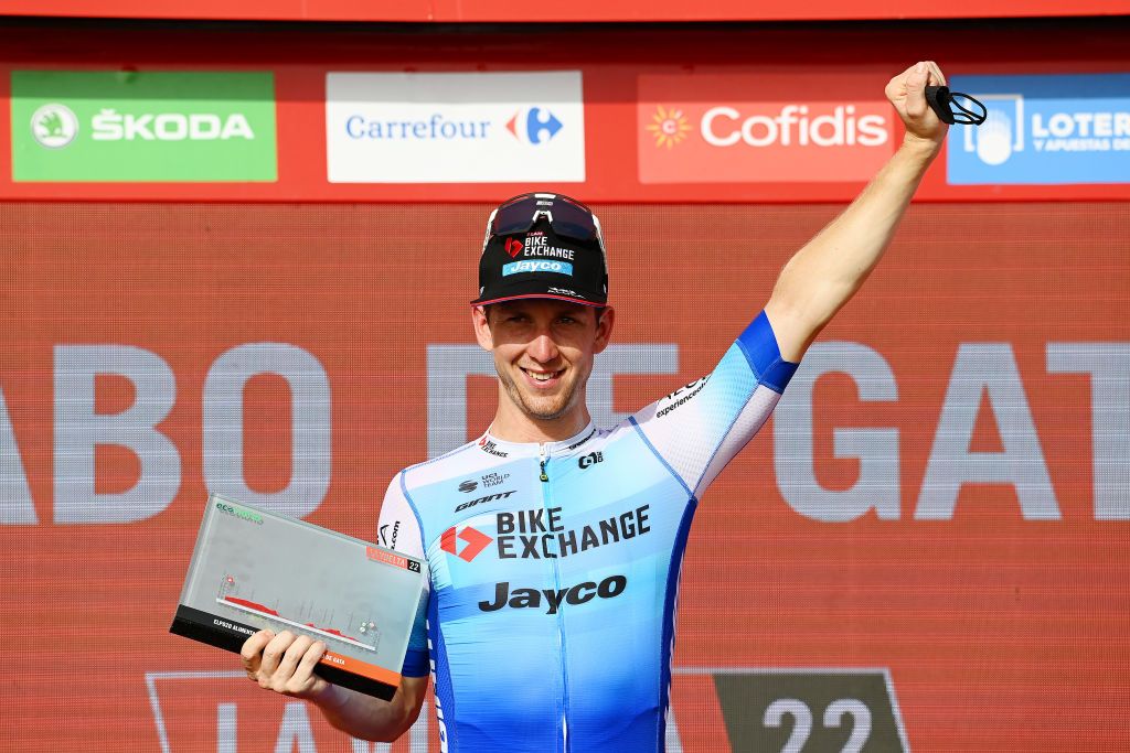 CABO DE GATA SPAIN AUGUST 31 Kaden Groves of Australia and Team BikeExchange Jayco celebrates winning the stage on the podium ceremony after the 77th Tour of Spain 2022 Stage 11 a 1912km stage from ElPozo Alimentacin Alhama de Murcia to Cabo de Gata LaVuelta22 WorldTour on August 31 2022 in Cabo de Gata Spain Photo by Tim de WaeleGetty Images
