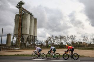 Caja Rural-Seguros RGA's Spanish rider Samuel Fernandez Garcia (C), TotalEnergies' French rider Alexandre Delettre (L) wearing the climber's dotted jersey and Uno-X Mobility's Norwegian rider Jonas Abrahamsen (R) cycle in a breakaway during the 2nd stage of the Paris-Nice cycling race, 183,9 km between Montesson and Bellegarde, on March 10, 2025. (Photo by Anne-Christine POUJOULAT / AFP)