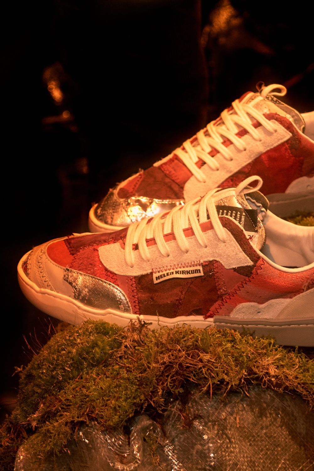 helen kirkum trainers on a pile of plastic