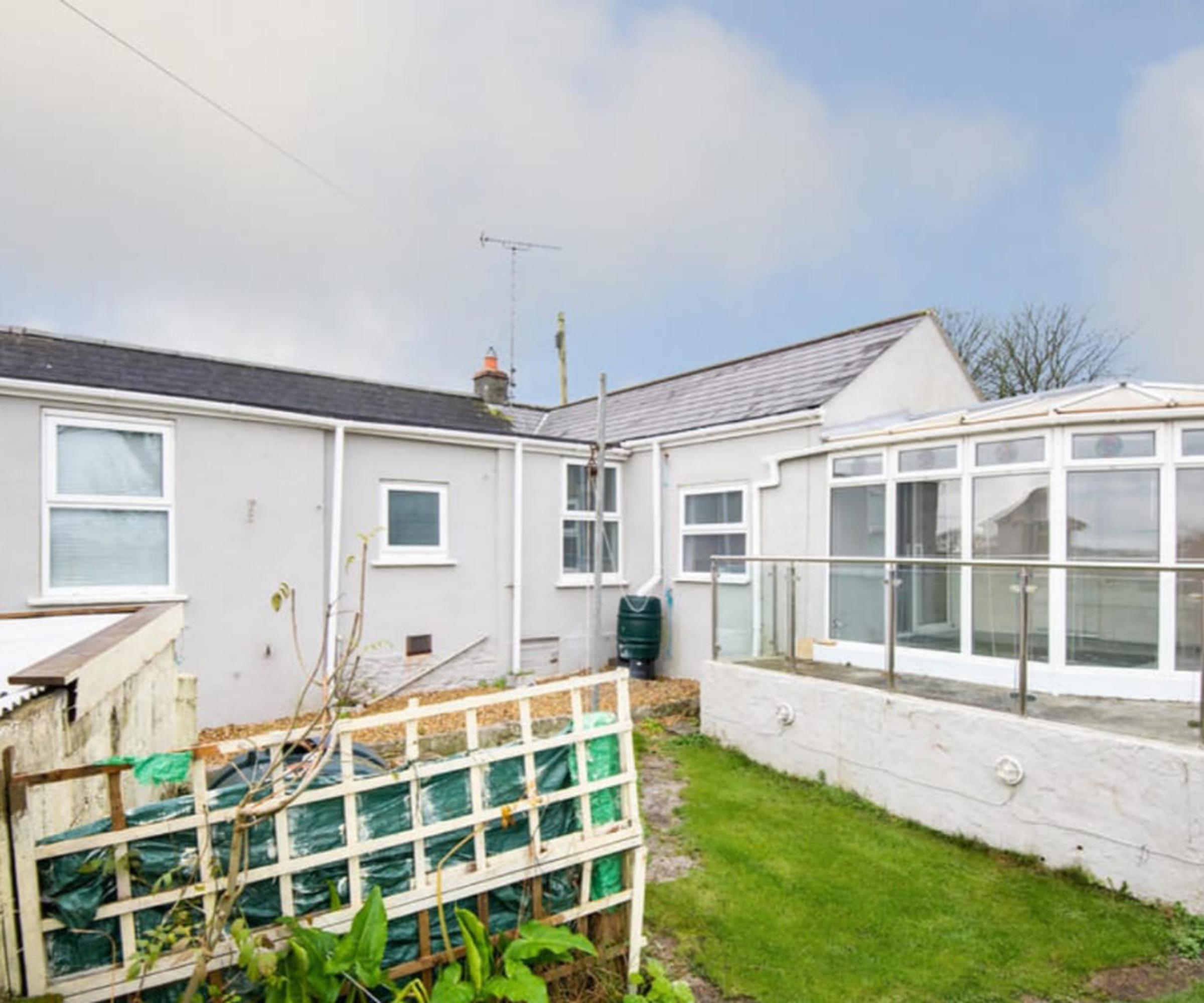 Before shot of a bungalow before a renovation
