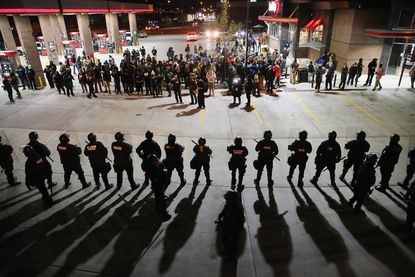 St. Louis police arrest Ferguson October protesters at gas station sit-in
