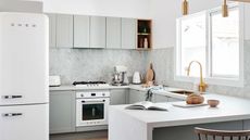 grey kitchen with smeg fridge and grey tiles