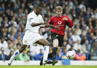Lucas Radebe in action for Leeds against Manchester United in 2002.