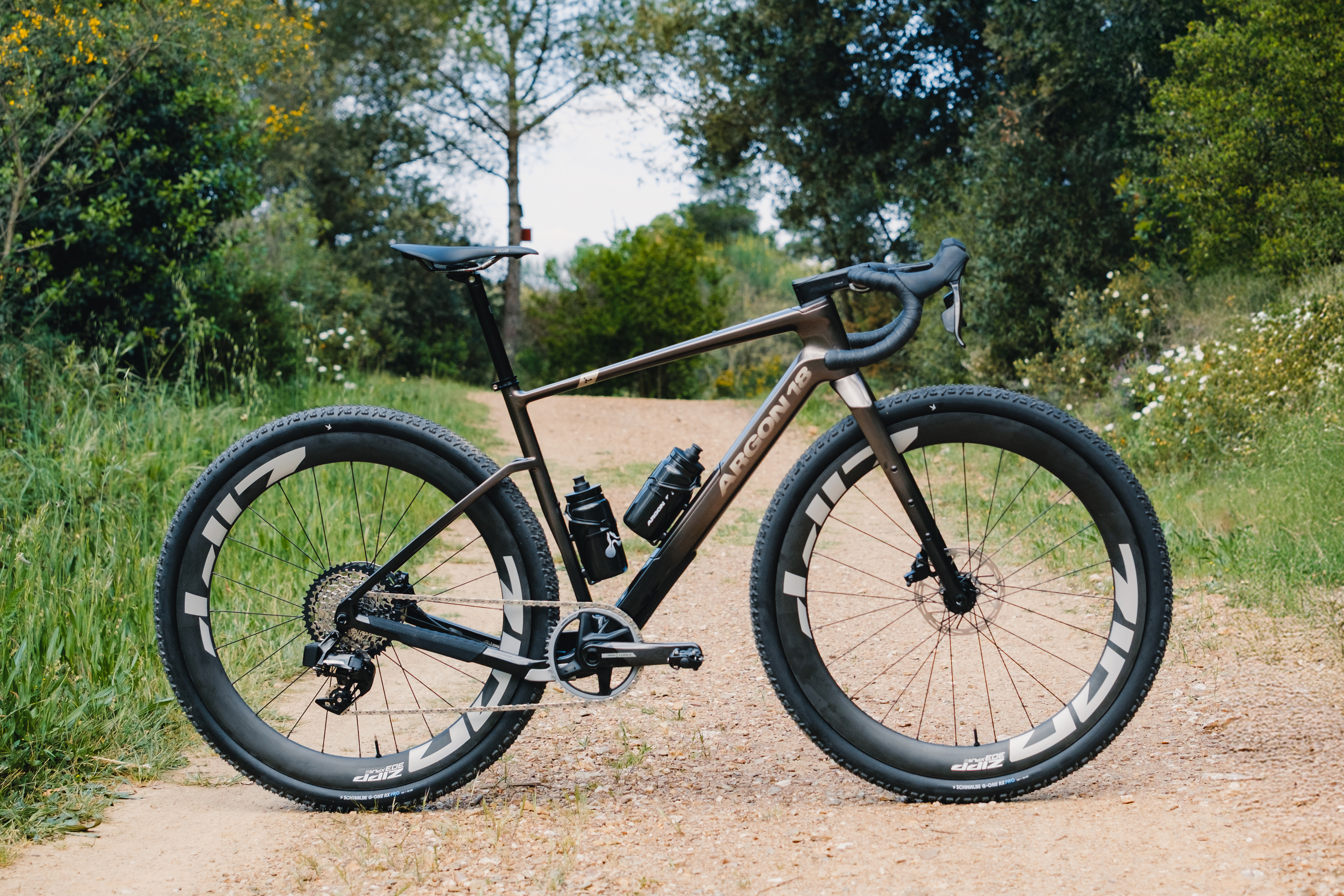 Argon 18 Dark Matter shown across a lane off road