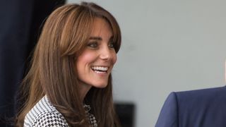 The Duchess of Cambridge with curtain bangs hairstyle