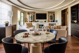 An interior shot of the Four Seasons Hyde Park, The Suite which features contemporary furniture and all the mod cons of a five star luxury hotel