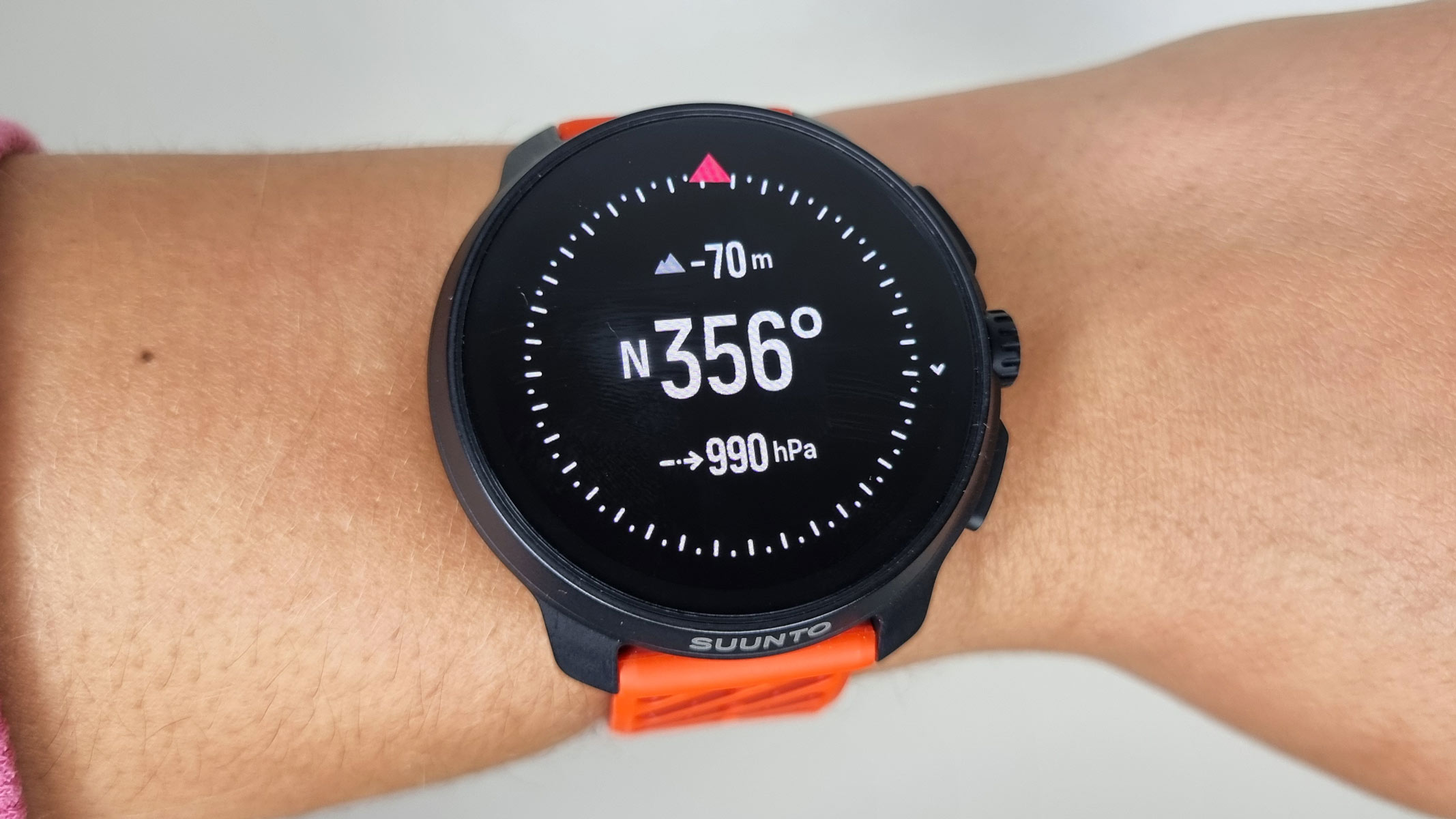 A close-up picture of our reviewer testing the Suunto Race 2