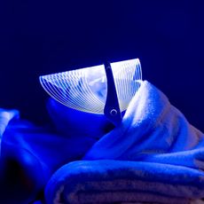 women using blue led light therapy for acne
