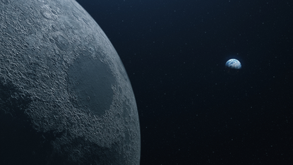 A close up of the moon in space with the Earth farther back and to the right