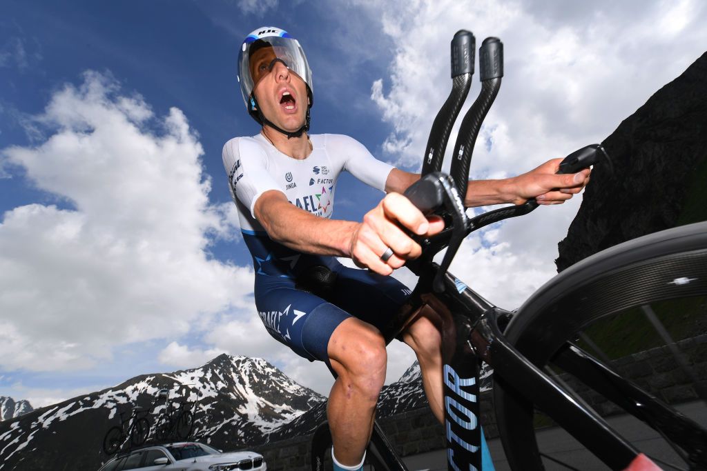ANDERMATT SWITZERLAND JUNE 12 Michael Woods of Canada and Team Israel StartUp Nation during the 84th Tour de Suisse 2021 Stage 7 a 232km Individual Time Trial stage from DisentisSedrun to Andermatt ITT Mountains Snow Landscape UCIworldtour tds tourdesuisse on June 12 2021 in Andermatt Switzerland Photo by Tim de WaeleGetty Images