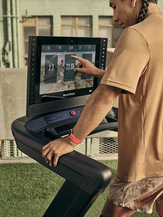The Fitbit Charge 6 integrating with a compatible workout machine.