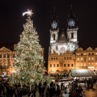 prague christmas market christmas tree people and building