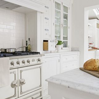 kitchen with cream range cooker