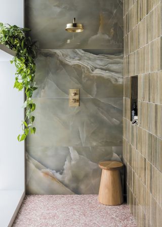 a tiled bathroom design shower room