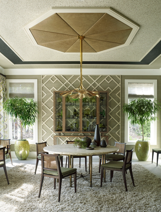 living room with millwork hexagonal detail on ceiling