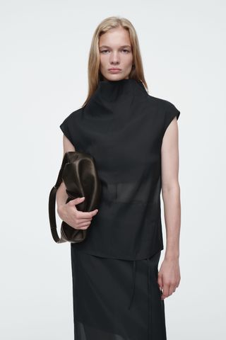 VU5pcoD2ASbSpZJckoHFnj-320-80 الاتجاهات العليا 4 بلا أكمام موجودة في كل مكان هذا الصيف