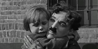 Jackie Coogan and Charlie Chaplin in The Kid
