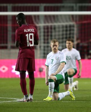 Republic of Ireland’s Daryl Horgan (centre) takes a knee before the friendly against Qatar