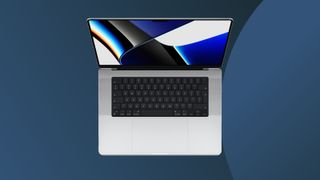 a product shot of the macbook pro on a dark background 