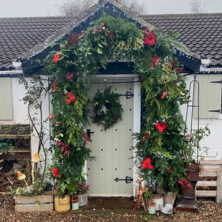 door entrance with christmas arch
