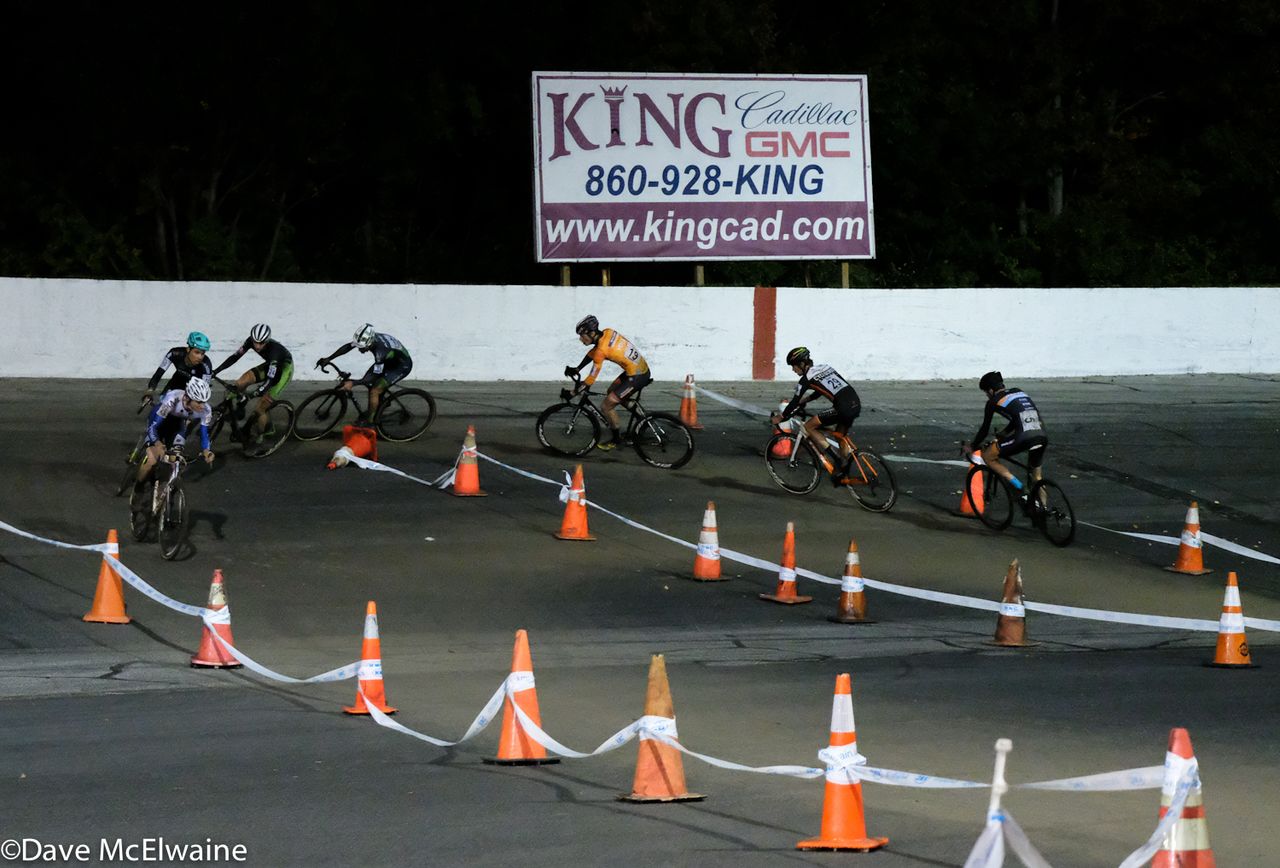 Chasers round a 180-degree turn on the track embankmant