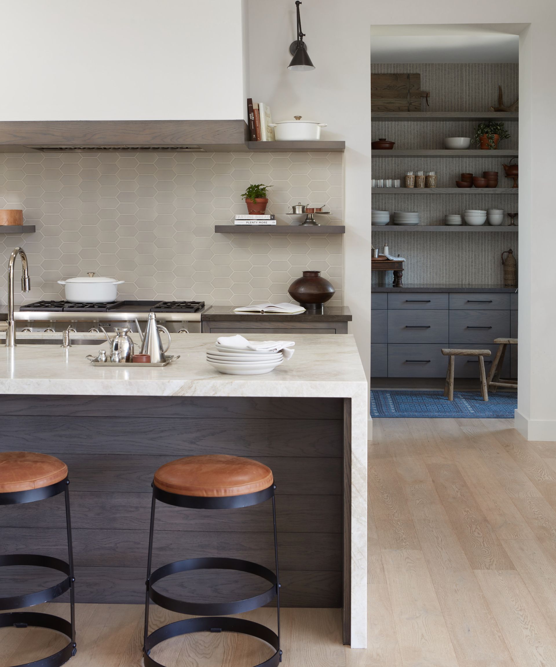 kitchen with open access to back kitchen and wooden floors